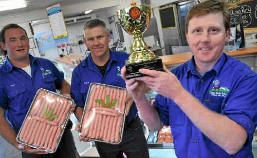 Carey Brothers Paul Carey holds the trophy for his winning pork sausages, with Sam Dight and Steve Carey. Carey Brothers Paul Carey holds the trophy for his winning pork sausages, with Sam Dight and Steve Carey.